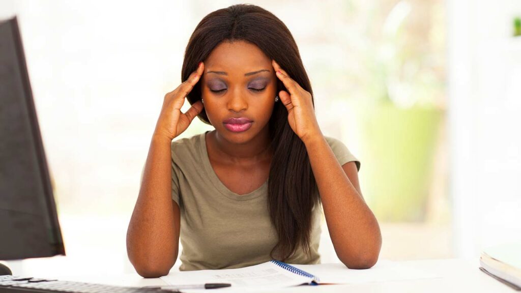 Vitamin Deficiency Alert! If Your Body Has Been Feeling "Off" Lately, Read This. A Nigerian woman experiencing symptoms of vitamin deficiency.