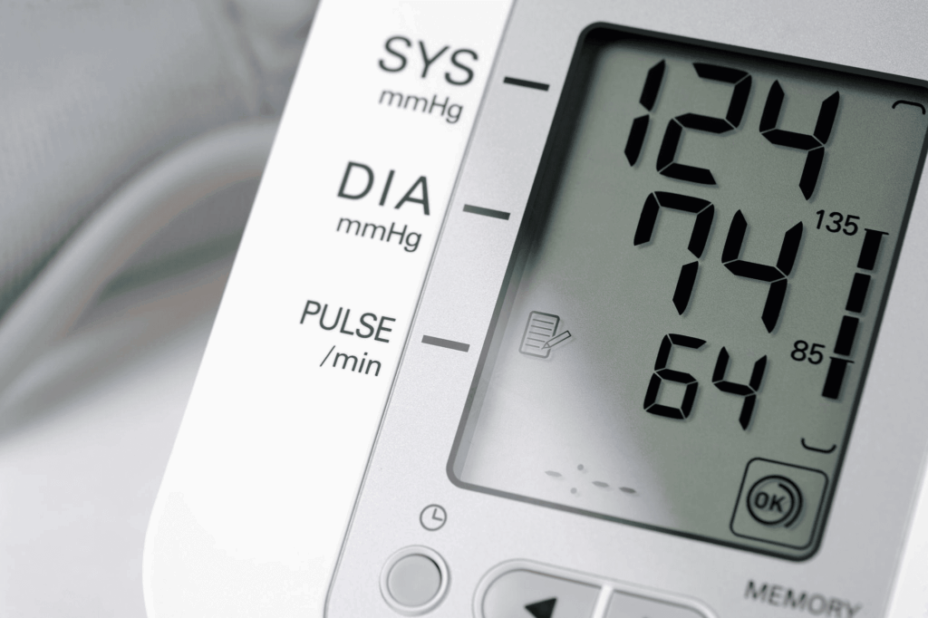 Blood Pressure Monitor Showing Reading