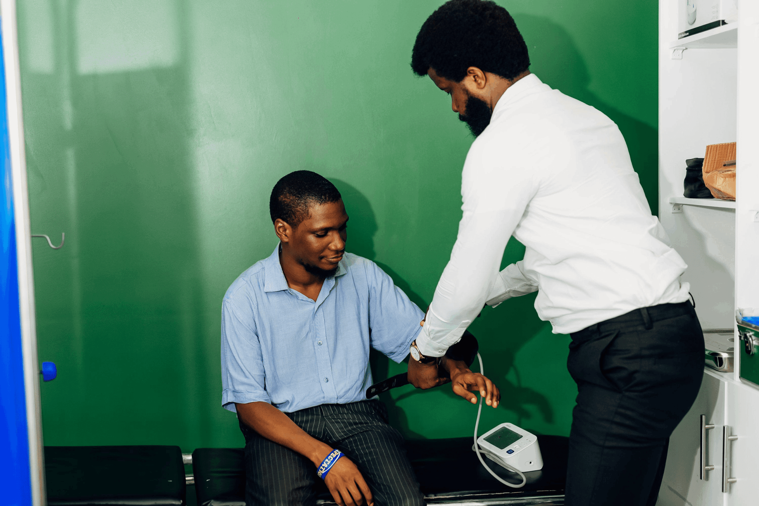 Young Man checking for high blood pressuure or hypertension in nigeria